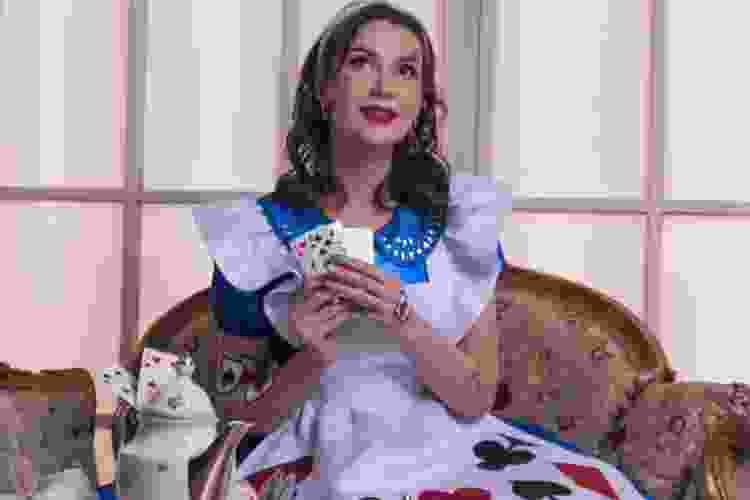 Woman wearing Alice in wonderland costume
