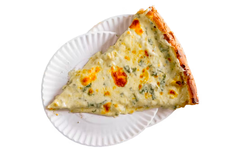 slice of artichoke pizza on paper plates for best pizza in Manhattan