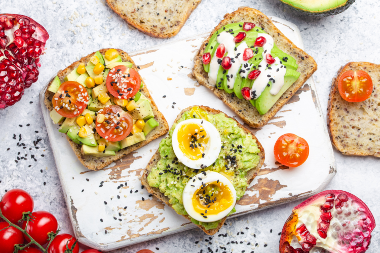 avocado toast with eggs and tomatoes