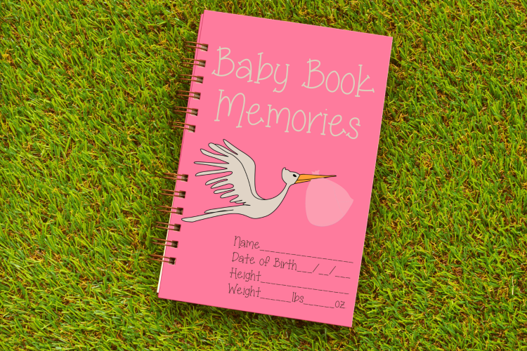 Make a baby book for this baby shower game idea.