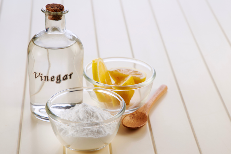 baking soda and vinegar can be used to get spray paint out of clothes.