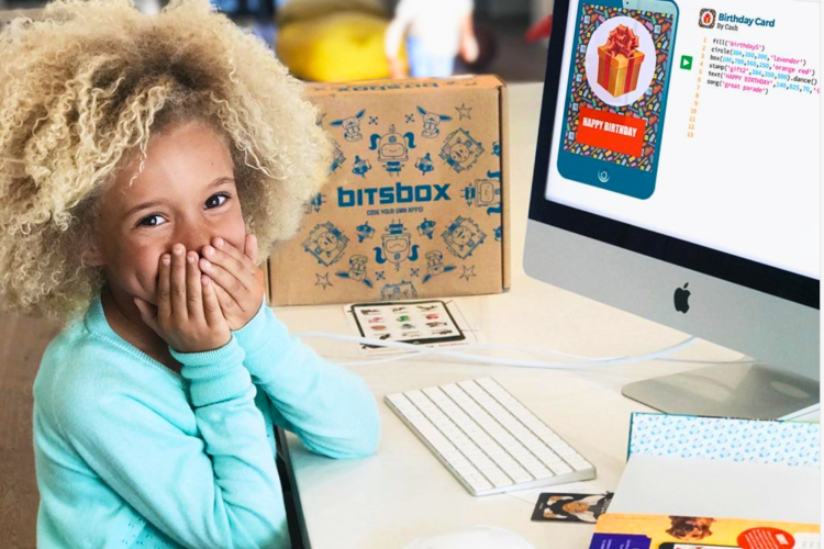 young girl excited to learn how to code with bitbox