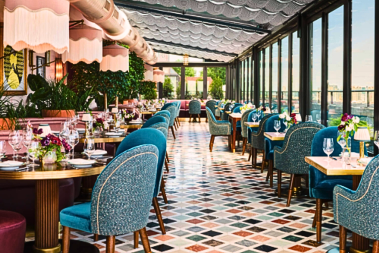 This rooftop restaurant in Boston has a blue and pink color scheme