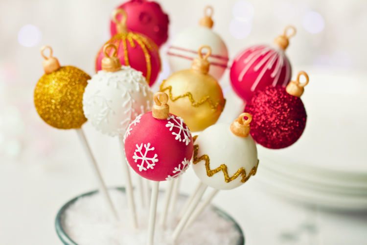cake pops shaped and decorated like Christmas ornaments