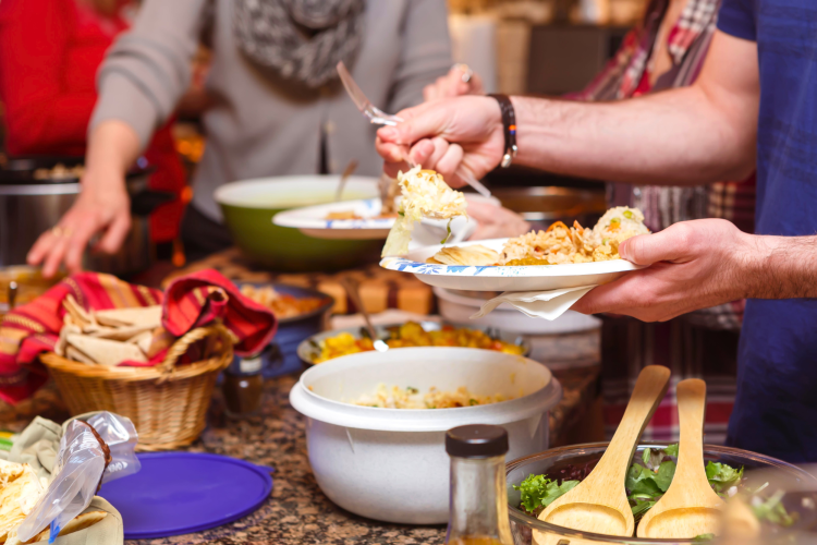 A good Christmas party idea to feed many is to host a Christmas potluck