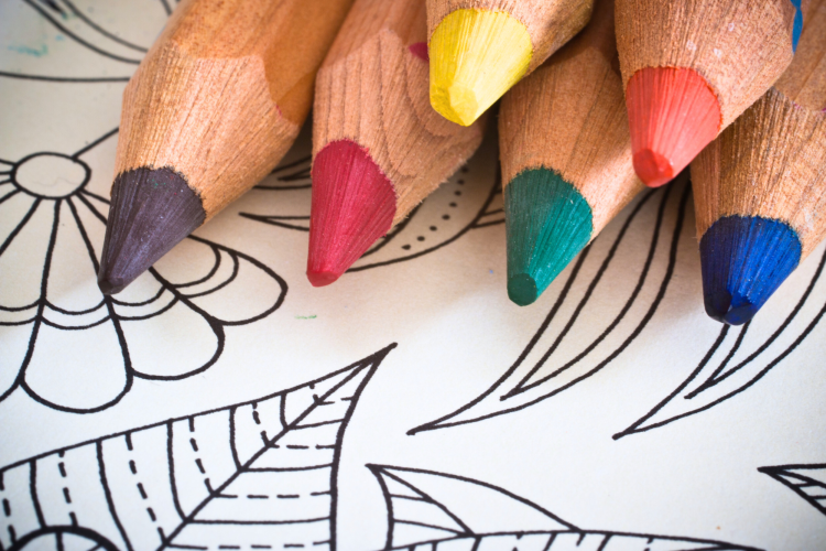 coloring book and pencils