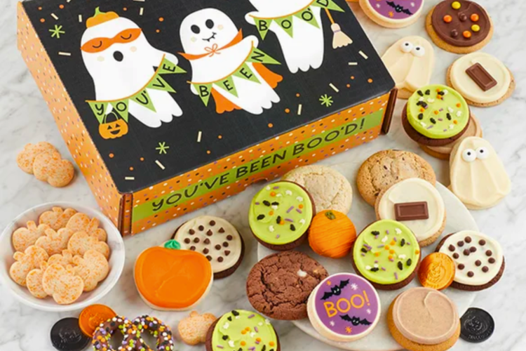 Halloween gift box with cute happy ghosts surrounded by tons of Halloween-themed cookies