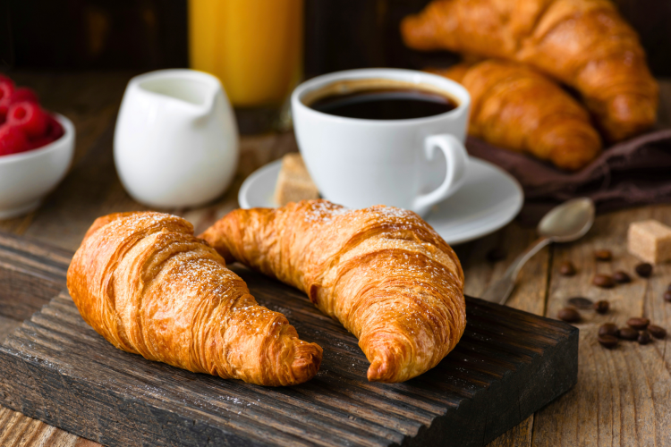 Croissants are a breakfast type of bread.