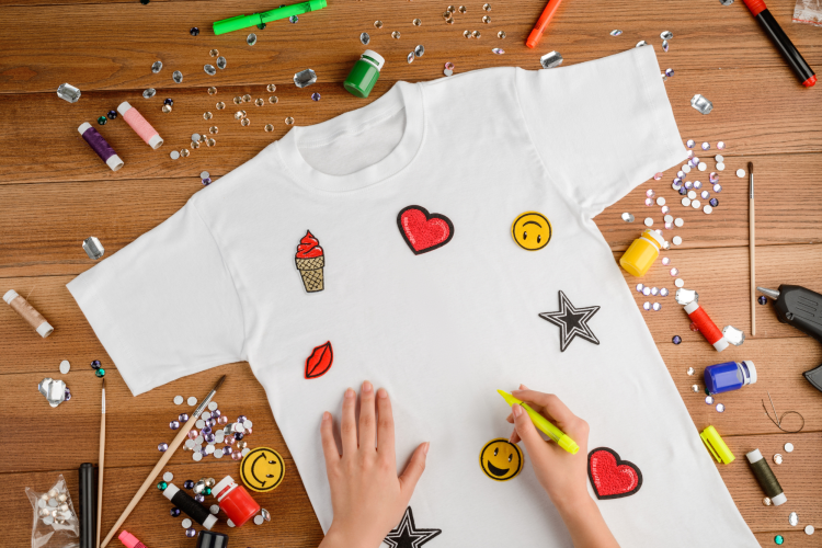 Fabric marker being used on a tee