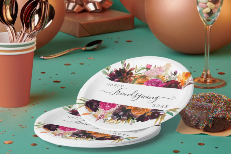 custom Friendsgiving decorations and paper plates on table