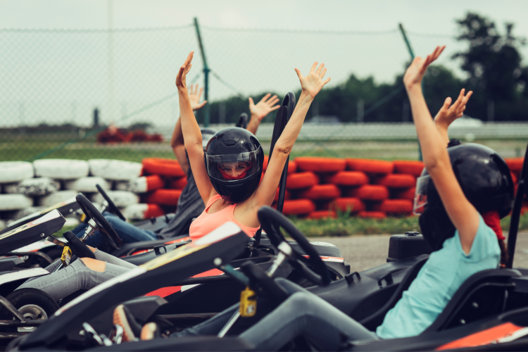 group of go kart racers on the track