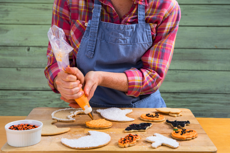 decorating Halloween-themed cookies