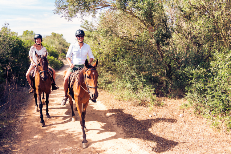 couple riding horseback