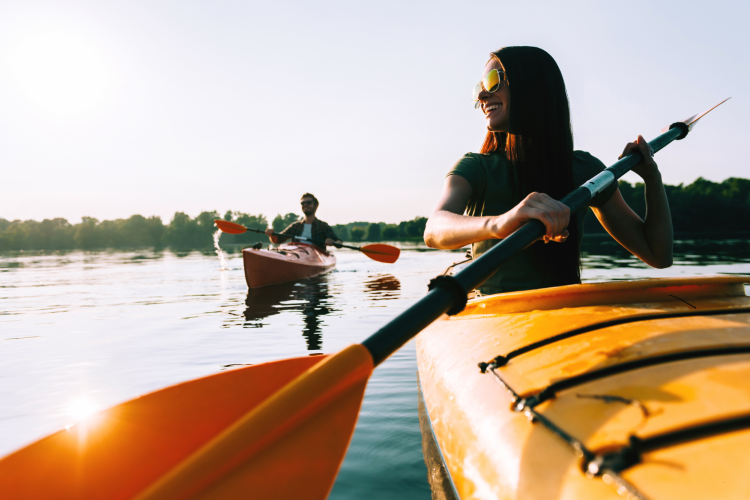 couple kayaking in river
