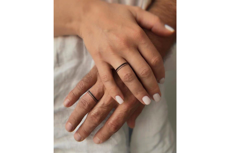 Linework wedding ring tattoo