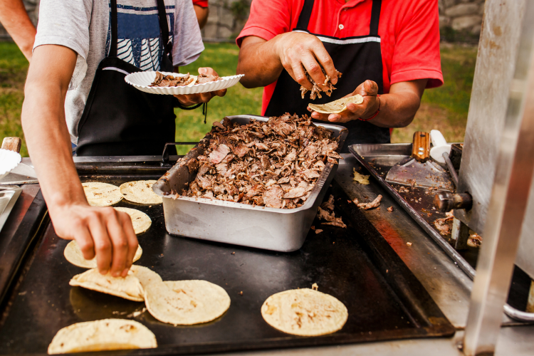 making tacos for national taco day