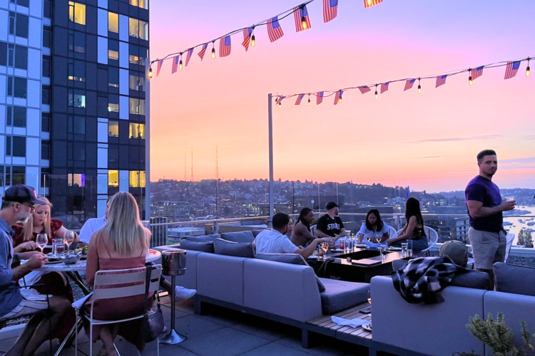 view the city landscape from this rooftop bar in Seattle.