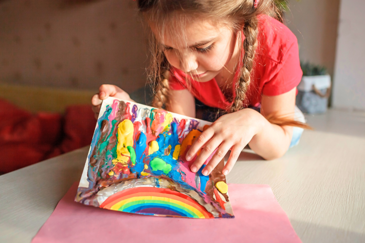 Melted Crayon Art is a fun mothers day painting idea for kids to do.
