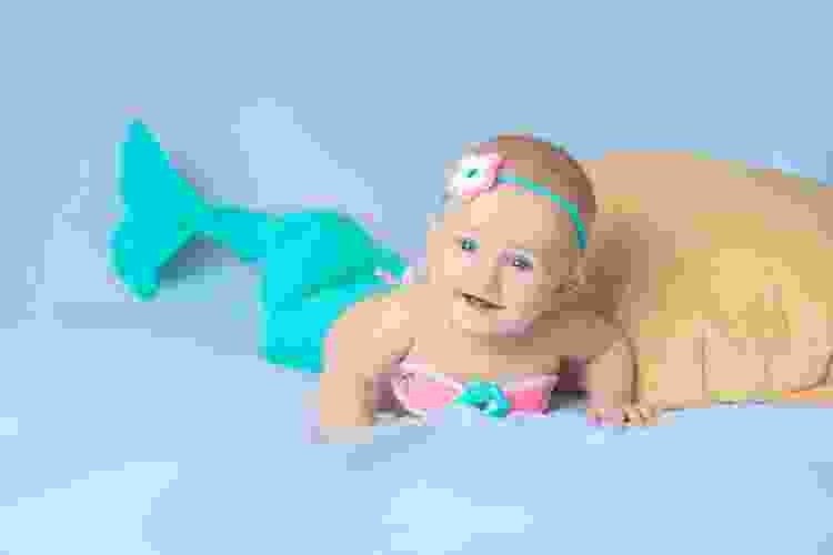 baby dressed as mermaid