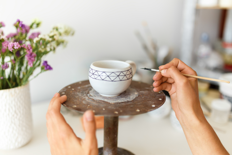 painting glazed ceramic with black stripes