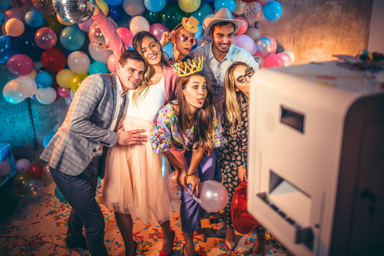 A fun party planning idea is to bring in a photo booth.