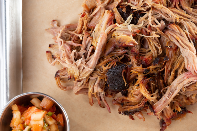 pulled pork on cutting board