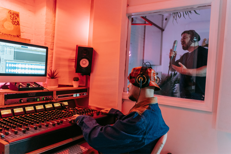 friends recording music in studio