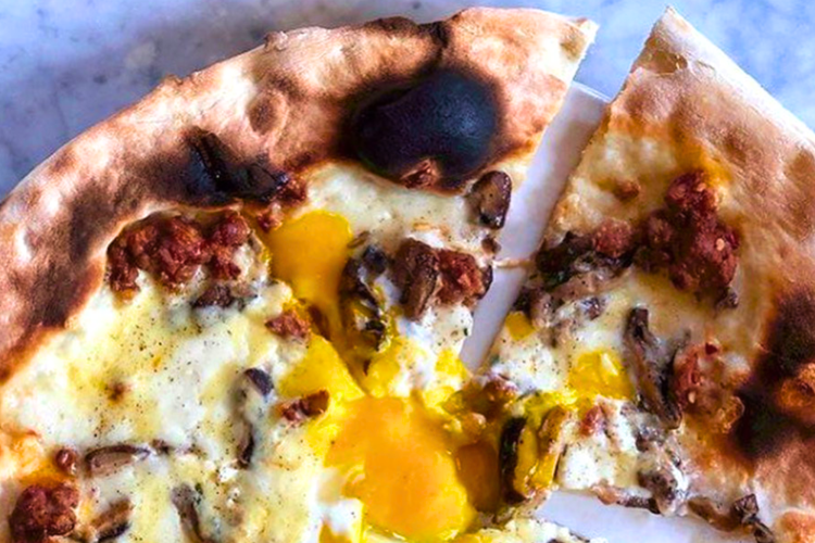 A cheese and egg pizza from this Restaurant in Back Bay, Boston