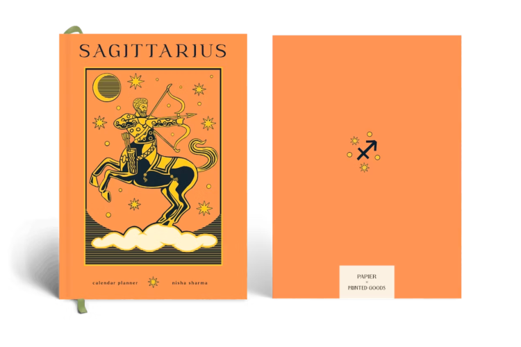 paper planner with Sagittarius zodiac sign