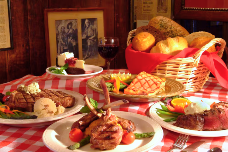 A selection of steak dinners and bread from this Steak Restaurants in Denver