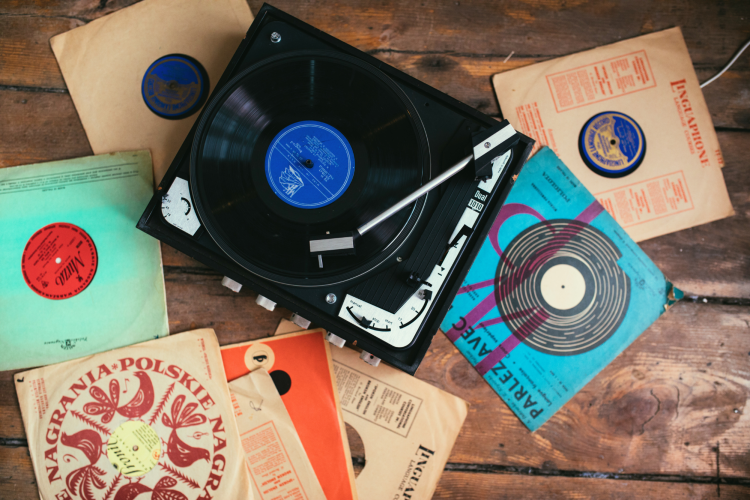 Turntable with vinyl records as retirement gift for men