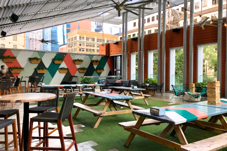 A bright and airy rooftop bar in Austin.