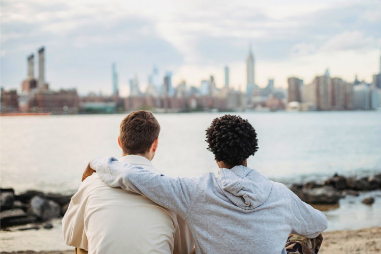 Two Best Friends sitting and looking at the view