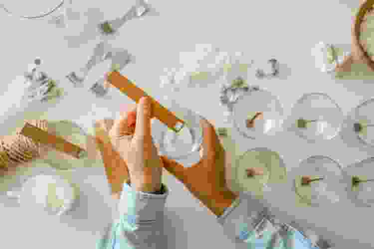 putting in candle wicks