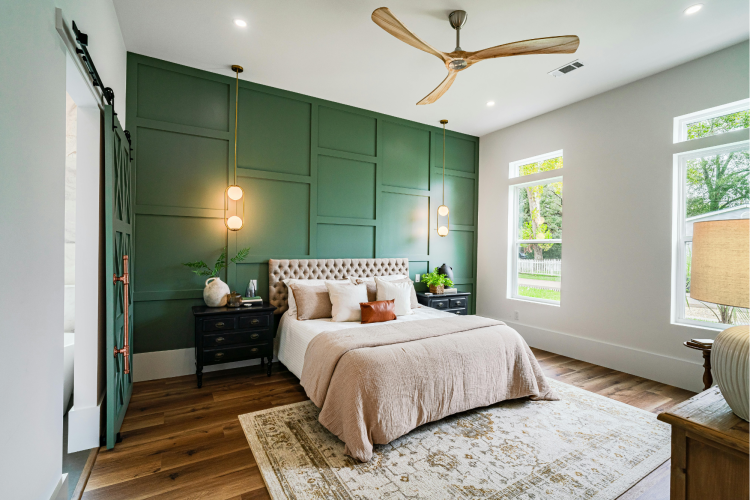 Green accent wall in bedroom