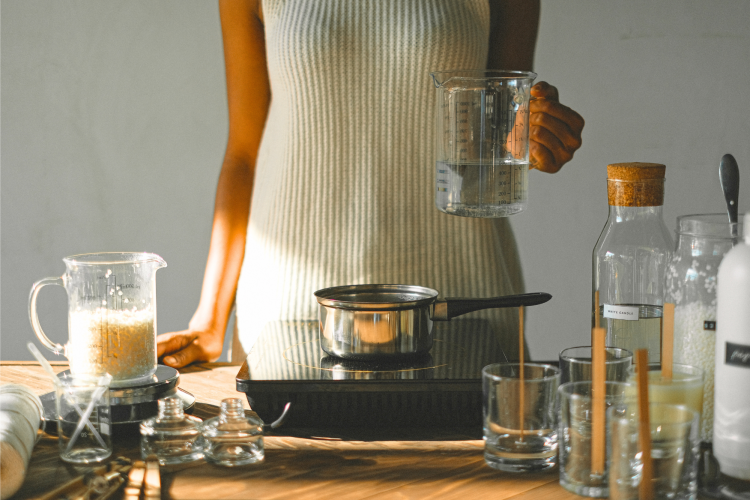 Woman making soy candles