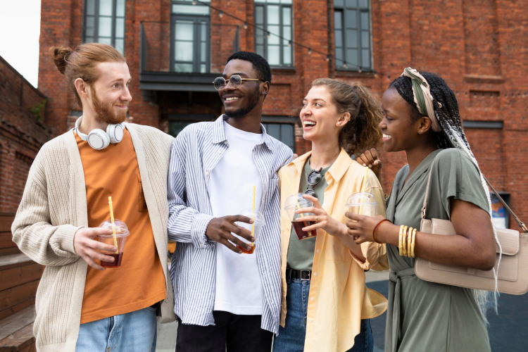 diverse friends having a drink and laughing