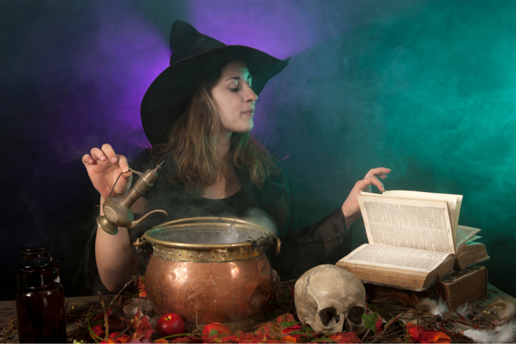 woman dressed as a witch with purple and green background