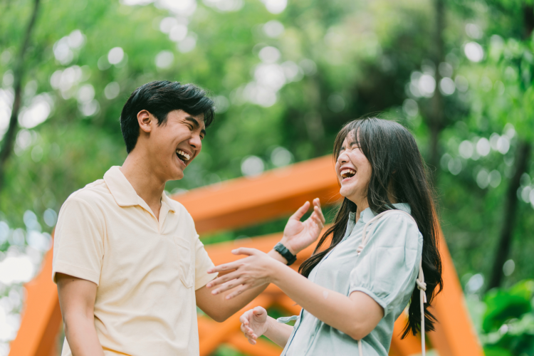 asian couple laughing