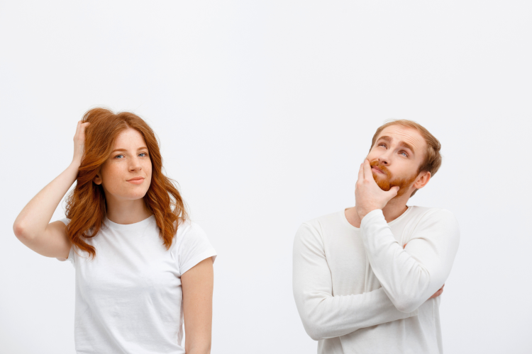 two adults thinking really hard