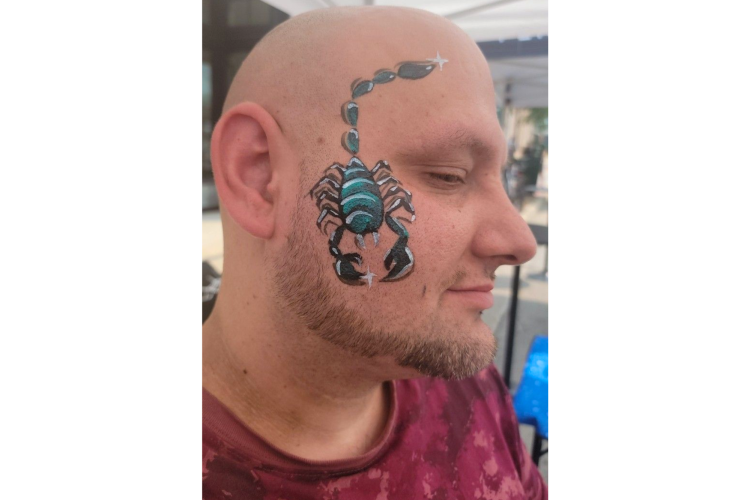 Man with Scorpion Face Paint