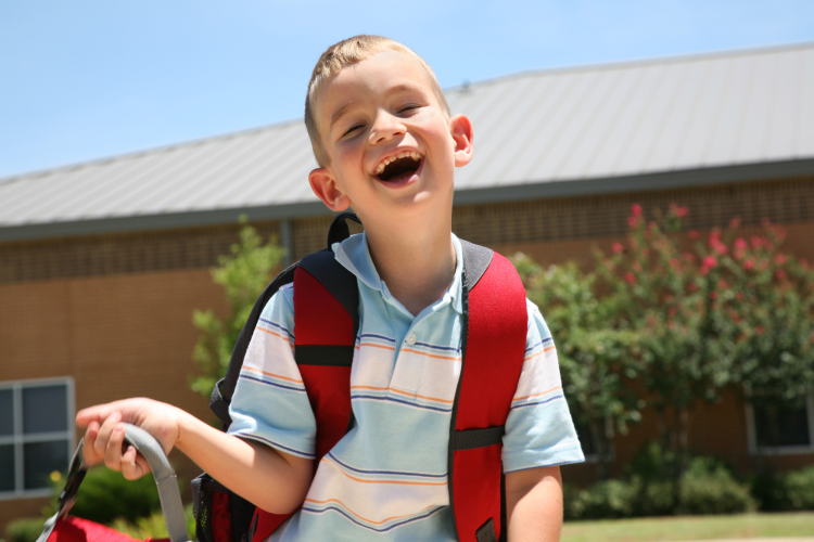 school kid laughing