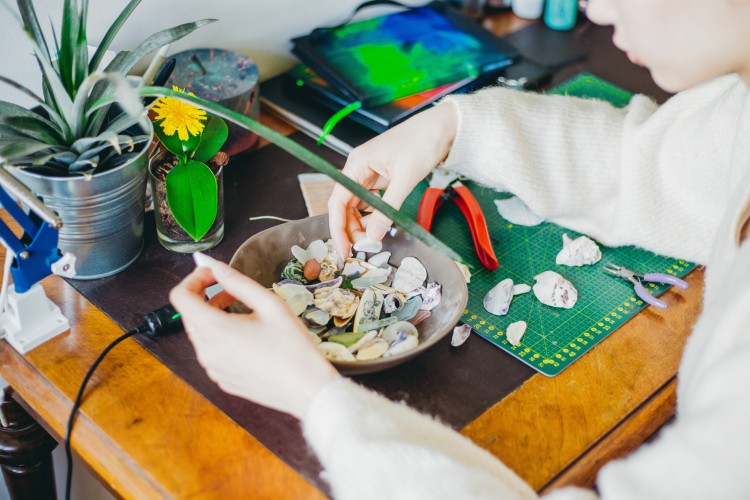 Woman Making DIY Earrings for Thrift Flip