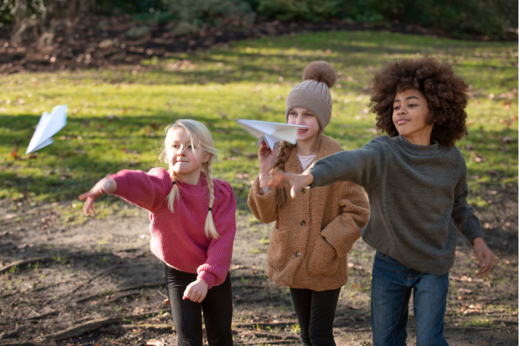 kids from Generation Alpha flying kites