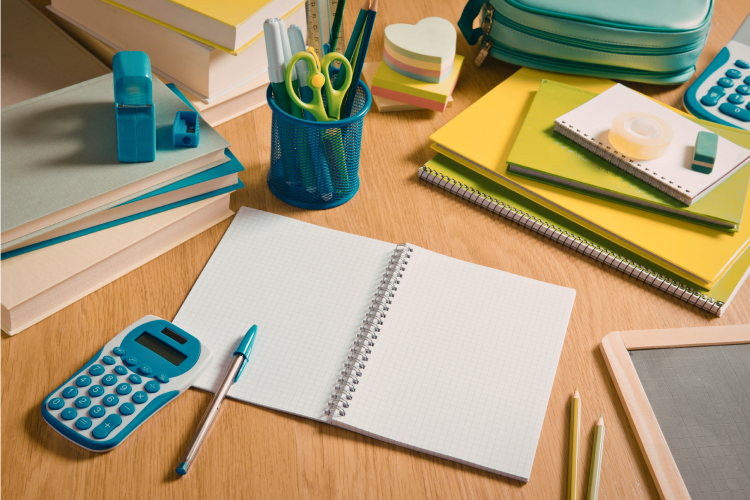 a desk filled with school supplies