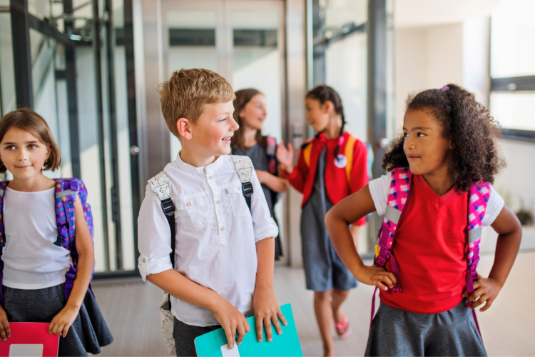 a couple of elementary school kids chatting
