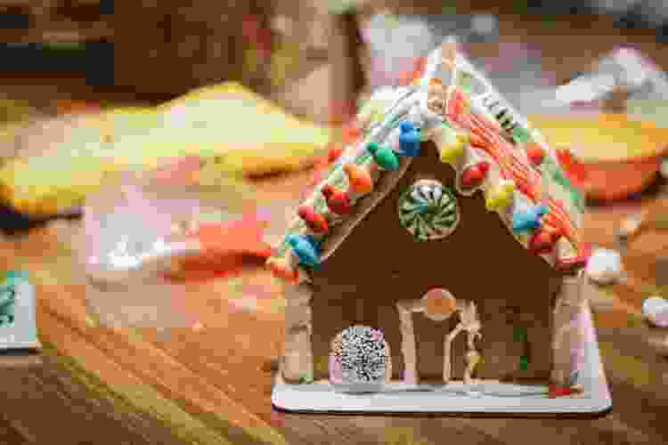 host a gingerbread house-making competition for a work christmas party idea