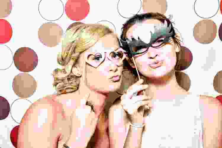 a photo booth party is a work christmas party idea that is actually fun