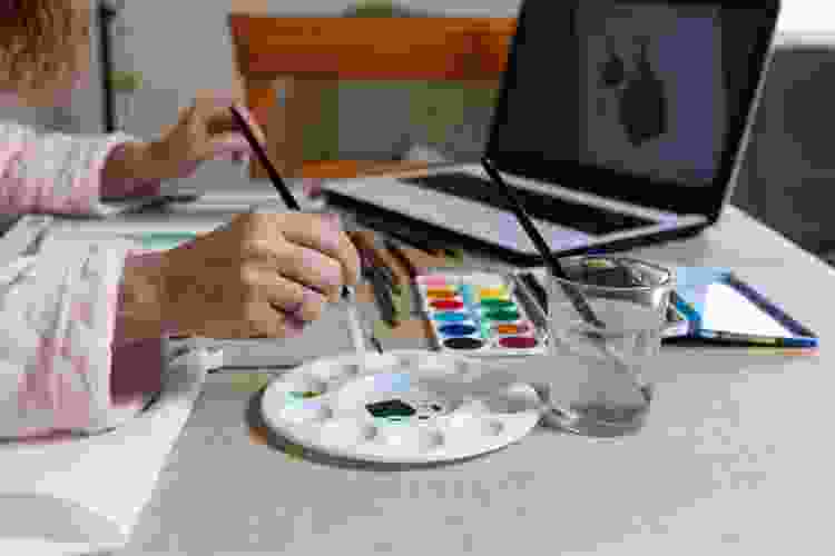 women painting with virtual online painting class