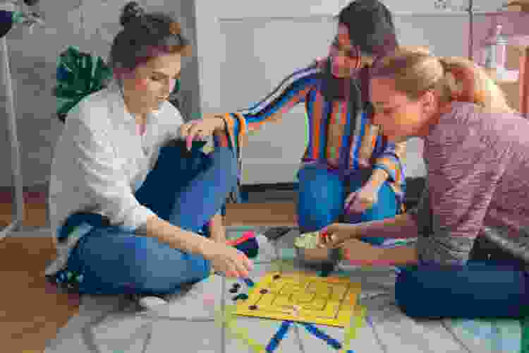 women playing board games